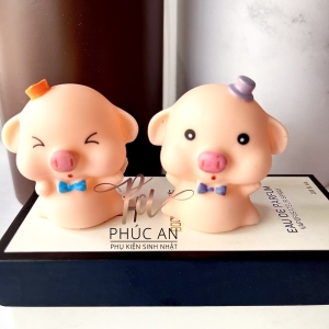Cặp heo hồng mini nhựa mềm trang trí bánh kem